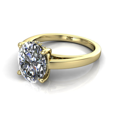 Itzel oval classic engagement ring in 18K Yellow Gold, three-quarter perspective showing the oval center diamond, double-claw prongs, and polished band