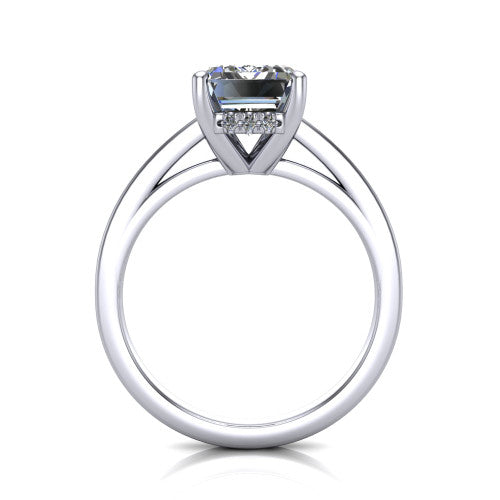 Itzel emerald-cut classic engagement ring in Platinum, through-finger front profile showing the hidden halo beneath the head