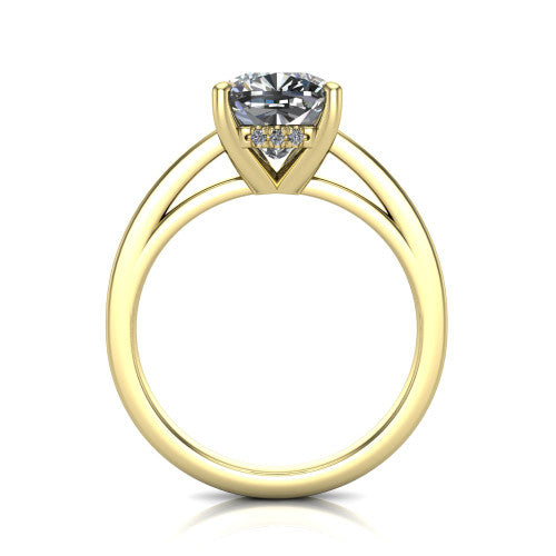 Itzel cushion-cut classic engagement ring in 18K Yellow Gold, through-finger front profile showing the hidden halo beneath the head