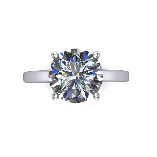 Itzel round classic engagement ring in 18K White Gold, top-down view showing the round center diamond and four double-claw prongs