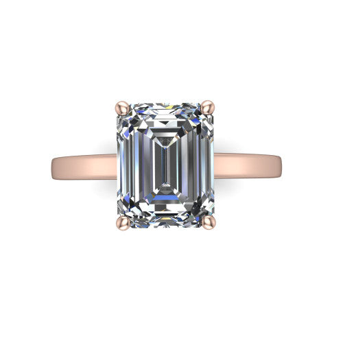 Itzel emerald-cut classic engagement ring in 18K Rose Gold, top-down view showing the emerald-cut center diamond and four double-claw prongs
