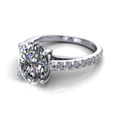 Jacqueline oval classic engagement ring in Platinum, three-quarter perspective showing the oval center diamond, double-claw prongs, and French pavé band