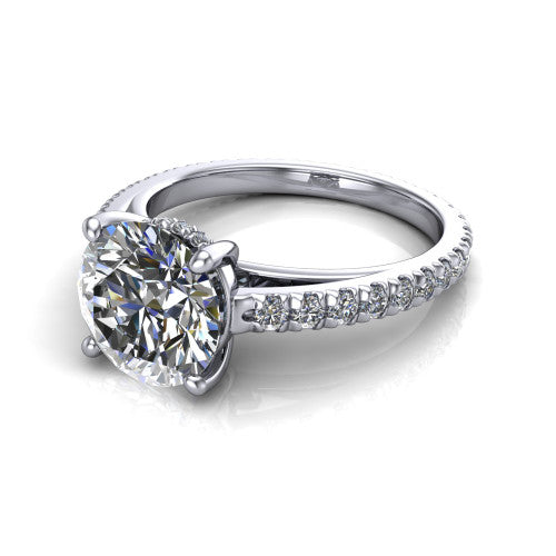 Jacqueline round classic engagement ring in 14K White Gold, three-quarter perspective showing the round center diamond, double-claw prongs, and French pavé band