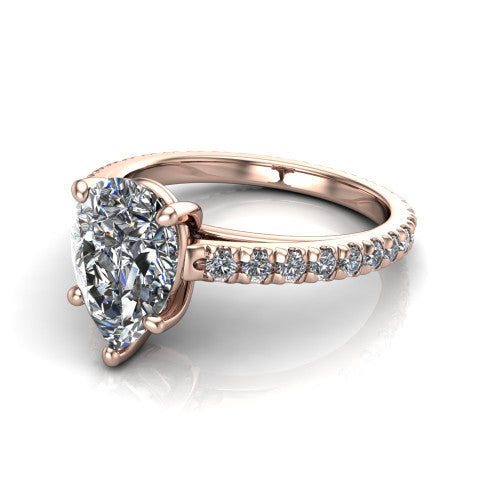 Jacqueline pear-shaped classic engagement ring in 18K Rose Gold, three-quarter perspective showing the pear-shaped center diamond, double-claw prongs, and French pavé band