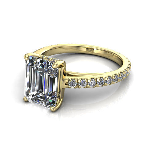 Jacqueline emerald-cut classic engagement ring in 14K Yellow Gold, three-quarter perspective showing the emerald-cut center diamond, double-claw prongs, and French pavé band