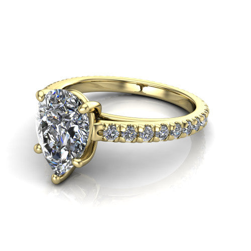 Jacqueline pear-shaped classic engagement ring in 18K Yellow Gold, three-quarter perspective showing the pear-shaped center diamond, double-claw prongs, and French pavé band