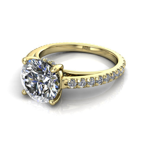 Jacqueline round classic engagement ring in 14K Yellow Gold, three-quarter perspective showing the round center diamond, double-claw prongs, and French pavé band