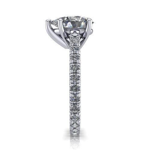 Jacqueline pear-shaped classic engagement ring in Platinum, side profile showing the hidden halo and French pavé band