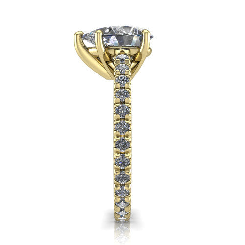 Jacqueline pear-shaped classic engagement ring in 18K Yellow Gold, side profile showing the hidden halo and French pavé band