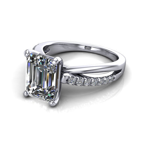 Marley emerald solitaire engagement ring in Platinum, three-quarter perspective showing the emerald center diamond above a split two-line pave shank