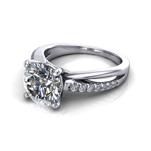 Marley round solitaire engagement ring in 18K White Gold, three-quarter perspective showing the round center diamond above a split two-line pave shank