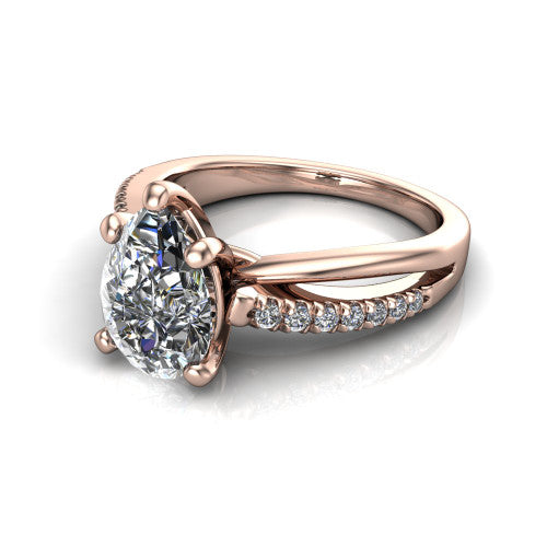Marley pear solitaire engagement ring in 18K Rose Gold, three-quarter perspective showing the pear center diamond above a split two-line pave shank