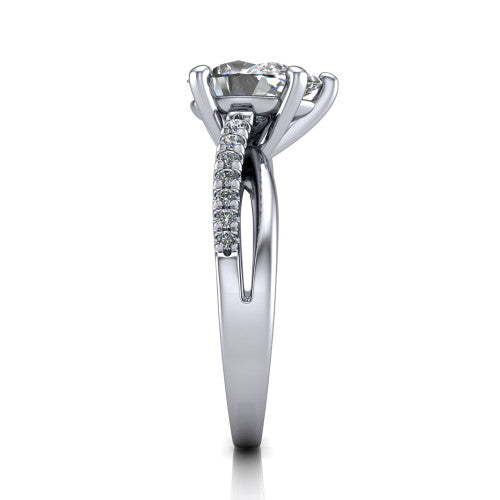 Marley pear solitaire engagement ring in Platinum, side profile showing the split two-line pave shank