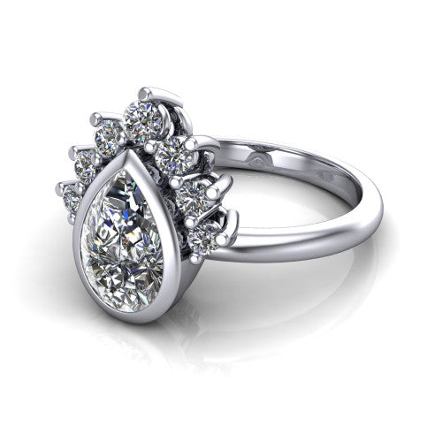 Kiara pear-shaped crown halo engagement ring in 18K White Gold, three-quarter perspective showing the bezel-set pear-shaped center diamond, diamond crown, and polished band