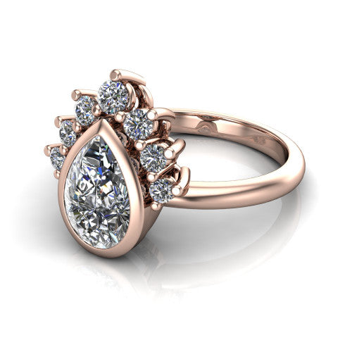 Kiara pear-shaped crown halo engagement ring in 14K Rose Gold, three-quarter perspective showing the bezel-set pear-shaped center diamond, diamond crown, and polished band
