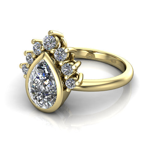 Kiara pear-shaped crown halo engagement ring in 18K Yellow Gold, three-quarter perspective showing the bezel-set pear-shaped center diamond, diamond crown, and polished band