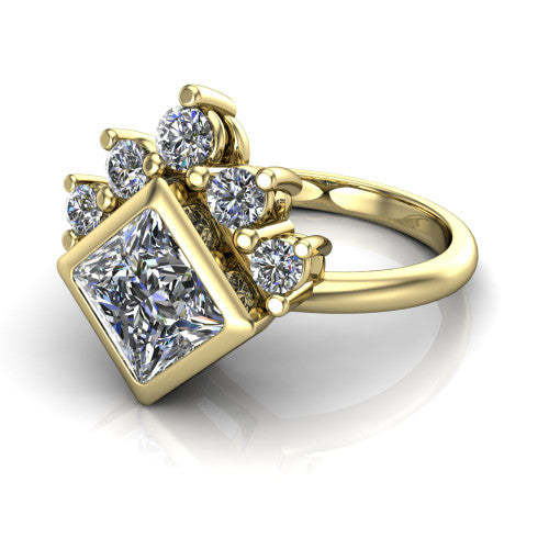 Kiara princess-cut crown halo engagement ring in 18K Yellow Gold, three-quarter perspective showing the bezel-set princess-cut center diamond, diamond crown, and polished band