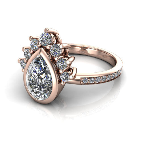 Lucille pear-shaped crown halo engagement ring in 14K Rose Gold, three-quarter perspective showing the bezel-set pear-shaped center diamond, diamond crown, and pavé band