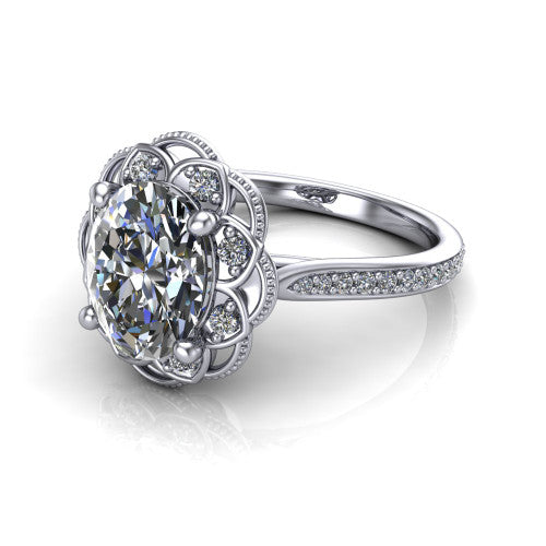 Mariana oval vintage halo engagement ring in 18K White Gold, three-quarter perspective showing the oval center diamond, ornate floral halo, and pavé band
