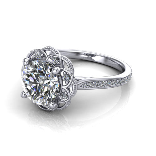 Mariana round vintage halo engagement ring in Platinum, three-quarter perspective showing the round center diamond, ornate floral halo, and pavé band