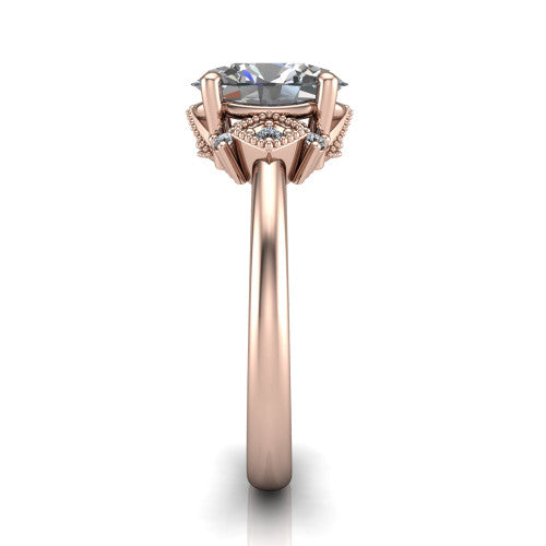 Harmony oval three stone engagement ring in 14K Rose Gold, side profile showing the diamond side clusters and polished band