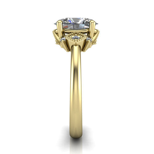 Harmony oval three stone engagement ring in 18K Yellow Gold, side profile showing the diamond side clusters and polished band