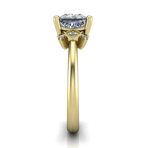 Harmony princess-cut three stone engagement ring in 18K Yellow Gold, side profile showing the diamond side clusters and polished band