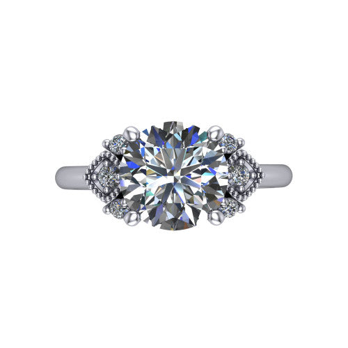 Harmony round three stone engagement ring in 14K White Gold, top-down view showing the round center diamond flanked by milgrain diamond clusters