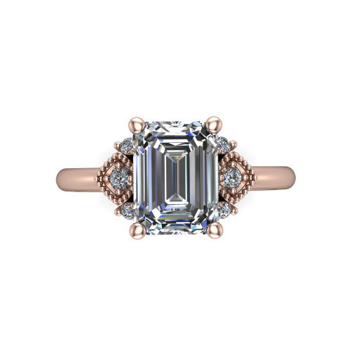 Harmony emerald-cut three stone engagement ring in 14K Rose Gold, top-down view showing the emerald-cut center diamond flanked by milgrain diamond clusters