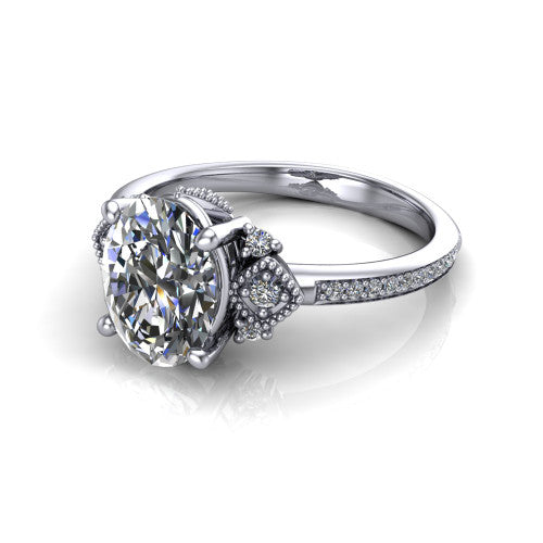 Presley oval three stone engagement ring in 14K White Gold, three-quarter perspective showing the oval center diamond, diamond side clusters, and pavé band