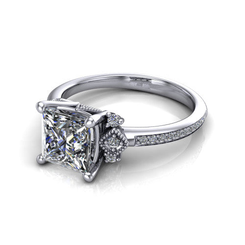 Presley princess-cut three stone engagement ring in Platinum, three-quarter perspective showing the princess-cut center diamond, diamond side clusters, and pavé band