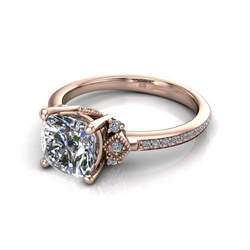 Presley cushion-cut three stone engagement ring in 18K Rose Gold, three-quarter perspective showing the cushion-cut center diamond, diamond side clusters, and pavé band