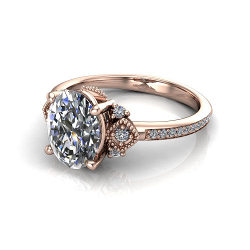 Presley oval three stone engagement ring in 18K Rose Gold, three-quarter perspective showing the oval center diamond, diamond side clusters, and pavé band