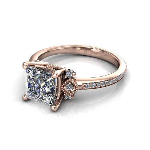 Presley princess-cut three stone engagement ring in 14K Rose Gold, three-quarter perspective showing the princess-cut center diamond, diamond side clusters, and pavé band