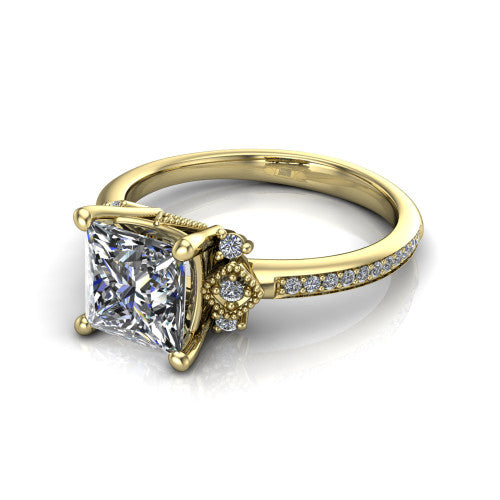 Presley princess-cut three stone engagement ring in 18K Yellow Gold, three-quarter perspective showing the princess-cut center diamond, diamond side clusters, and pavé band
