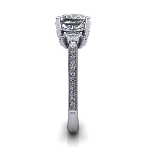 Presley cushion-cut three stone engagement ring in 14K White Gold, side profile showing the diamond side clusters and pavé band