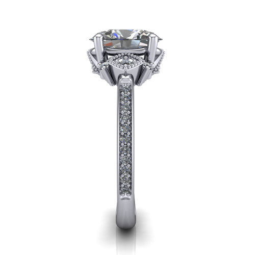 Presley oval three stone engagement ring in 18K White Gold, side profile showing the diamond side clusters and pavé band