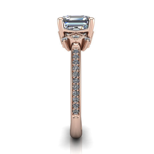 Presley square emerald-cut three stone engagement ring in 18K Rose Gold, side profile showing the diamond side clusters and pavé band