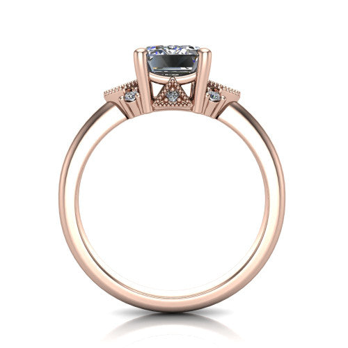 Presley emerald-cut three stone engagement ring in 18K Rose Gold, through-finger front profile showing the cluster shoulders and gallery