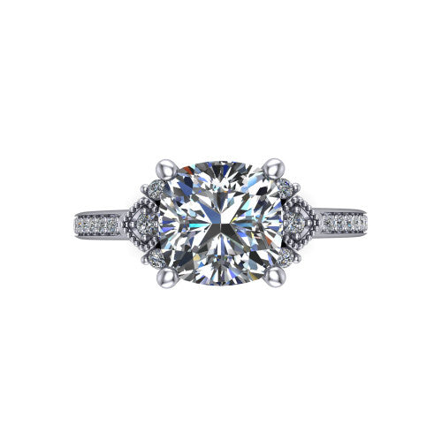 Presley cushion-cut three stone engagement ring in Platinum, top-down view showing the cushion-cut center diamond flanked by milgrain diamond clusters
