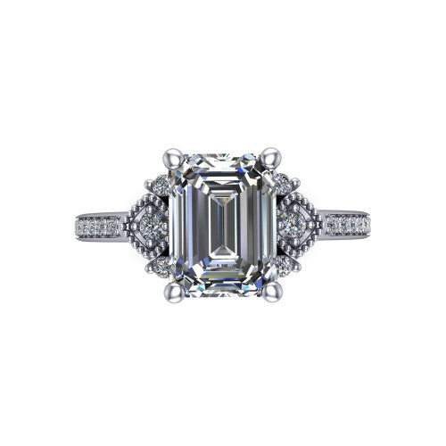 Presley emerald-cut three stone engagement ring in Platinum, top-down view showing the emerald-cut center diamond flanked by milgrain diamond clusters