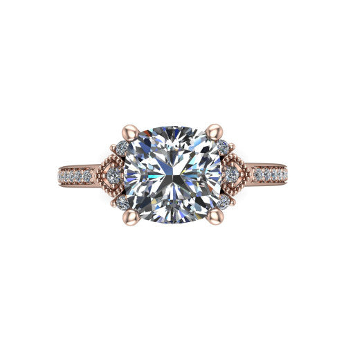Presley cushion-cut three stone engagement ring in 14K Rose Gold, top-down view showing the cushion-cut center diamond flanked by milgrain diamond clusters
