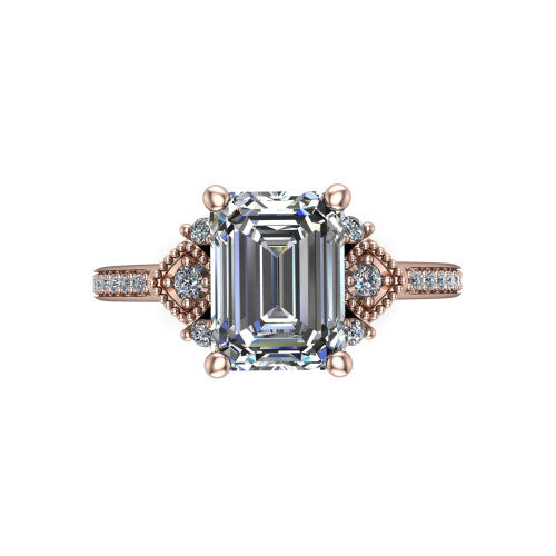 Presley emerald-cut three stone engagement ring in 18K Rose Gold, top-down view showing the emerald-cut center diamond flanked by milgrain diamond clusters
