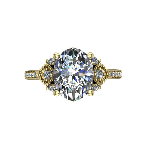 Presley oval three stone engagement ring in 18K Yellow Gold, top-down view showing the oval center diamond flanked by milgrain diamond clusters