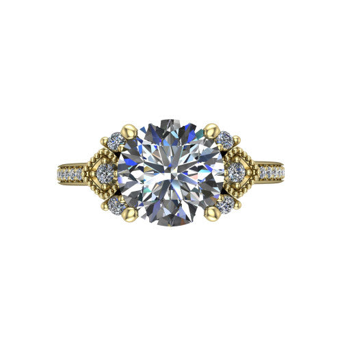 Presley round three stone engagement ring in 14K Yellow Gold, top-down view showing the round center diamond flanked by milgrain diamond clusters