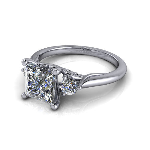 Harley princess three stone engagement ring in 18K White Gold, three-quarter perspective showing the brilliant princess-cut center diamond flanked by two round side diamonds on tapered cathedral shoulders