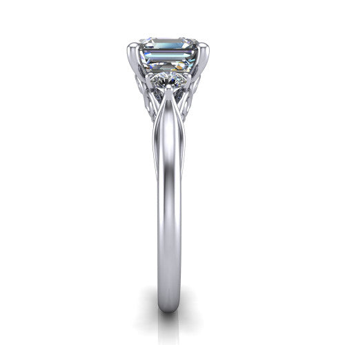 Harley square emerald three stone engagement ring in Platinum, side profile showing the filigree scroll gallery, tapered cathedral shoulders, and polished band