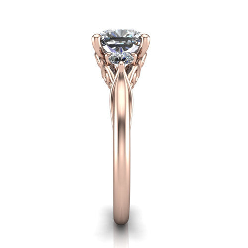 Harley cushion three stone engagement ring in 14K Rose Gold, side profile showing the filigree scroll gallery, tapered cathedral shoulders, and polished band