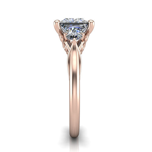 Harley princess three stone engagement ring in 18K Rose Gold, side profile showing the filigree scroll gallery, tapered cathedral shoulders, and polished band