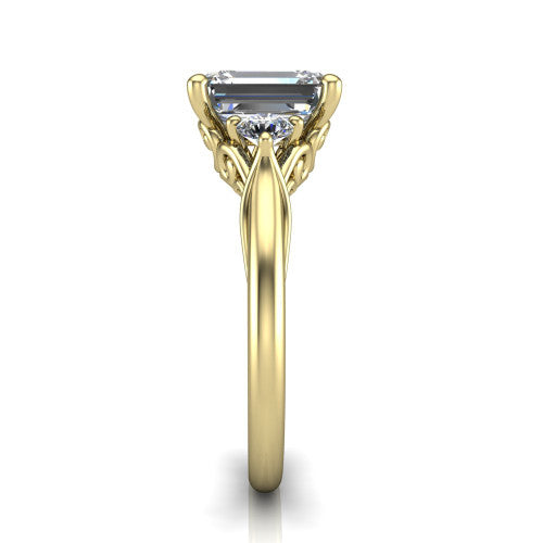 Harley emerald three stone engagement ring in 14K Yellow Gold, side profile showing the filigree scroll gallery, tapered cathedral shoulders, and polished band